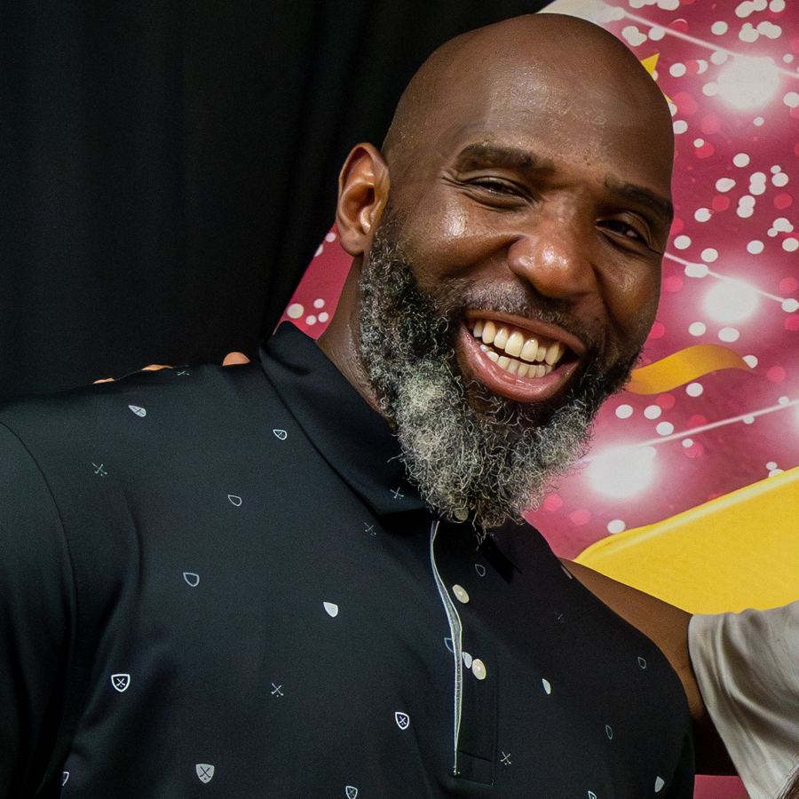 Head Coach and Director of Programs Peter Wehye, smiling